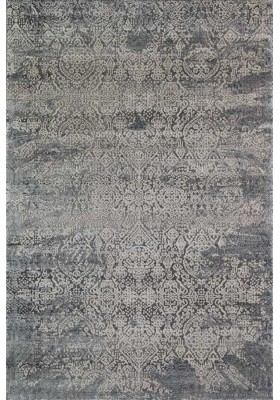 Muted design distressed rug